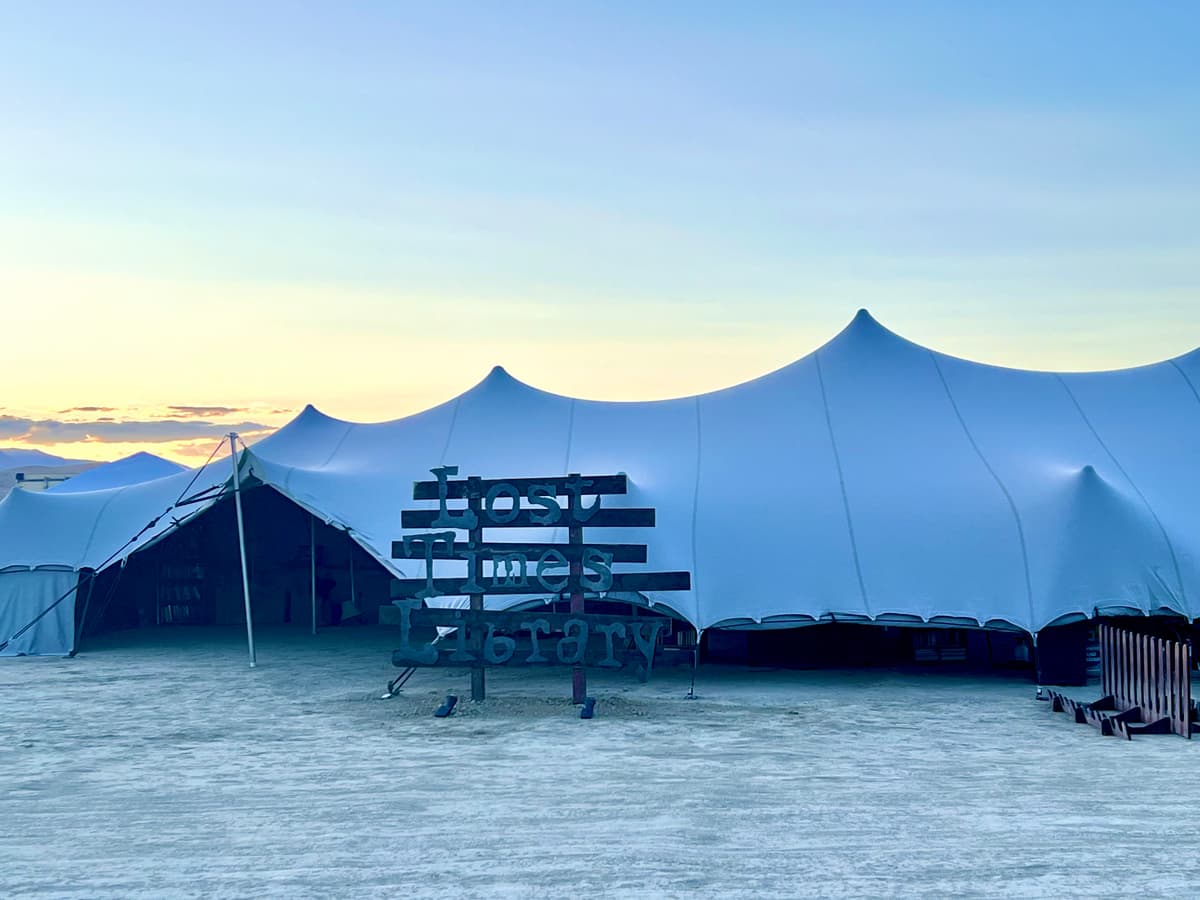 The Lost Times Library sign at dawn